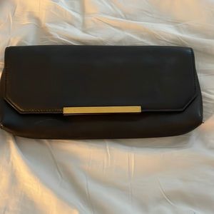 Jcrew black leather clutch with gold hardware